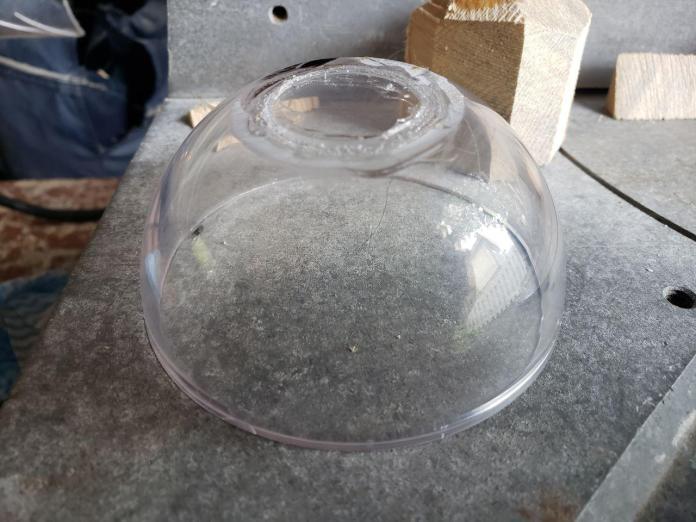 Lens on the acrylic dome